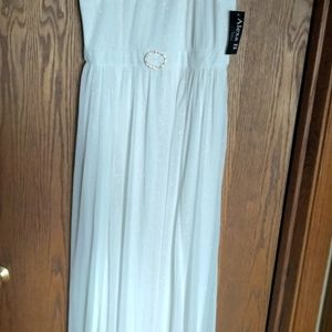 Alexa B long sheer sleeveless dress with crystal embellishment at waist.